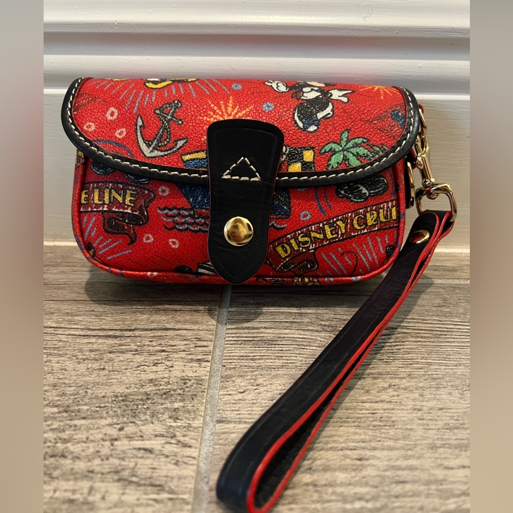 Dooney and Bourke Disney Cruise Line wristlet in RED- LIKE NEW